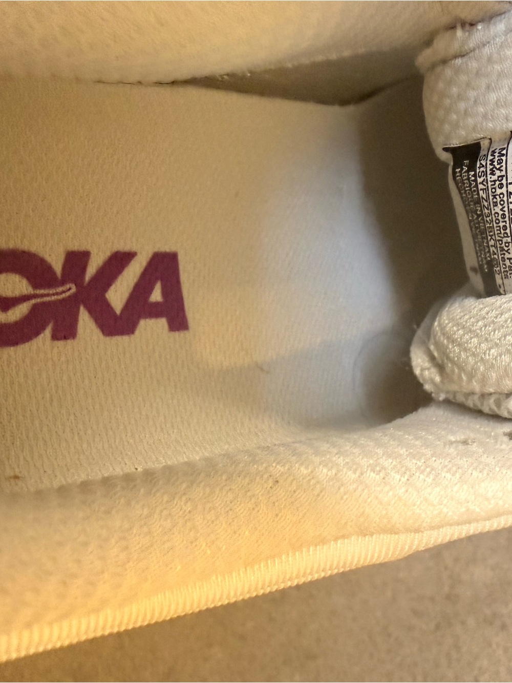 Hoka Women's White Sneaker with Pink Logo Accent
